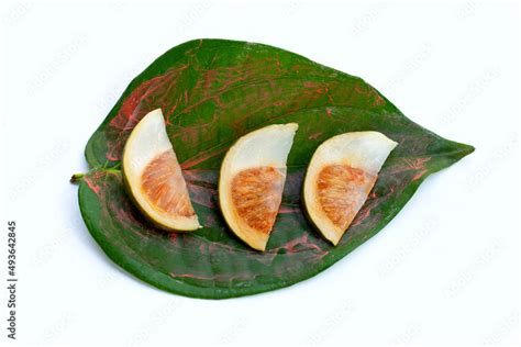 Chewing betel nut, Betel nut with cal lime powder on betel leaves Stock ...