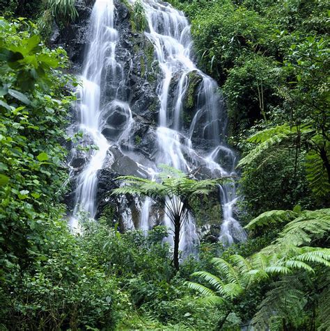 Waterfall Cascading Over Rocks Photograph by David Pluth