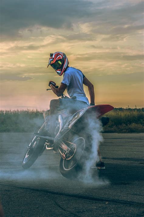 Photo of Man Riding Motorcycle · Free Stock Photo