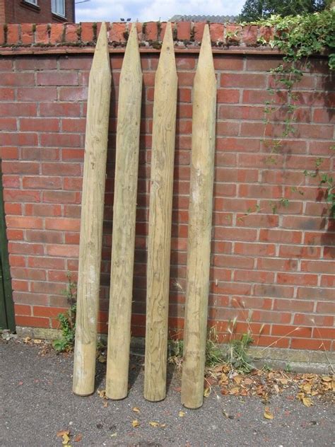 12 Half round wooden treated fencing posts | in Norwich, Norfolk | Gumtree