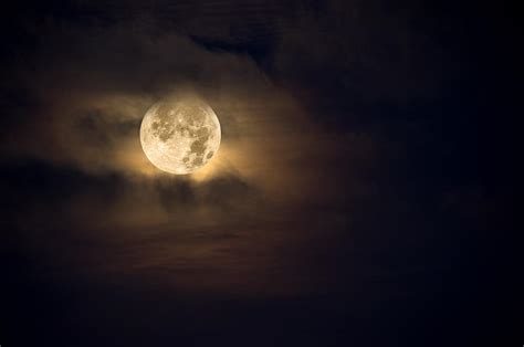 Amber moon Photograph by Joe Belanger