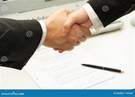 Business Man Shake Hands after Signing a Contract Stock Photo - Image ...