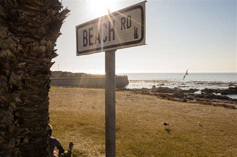 Kalk Bay Beach Road Stock Photo - Download Image Now - Adult, Africa, Beach - iStock