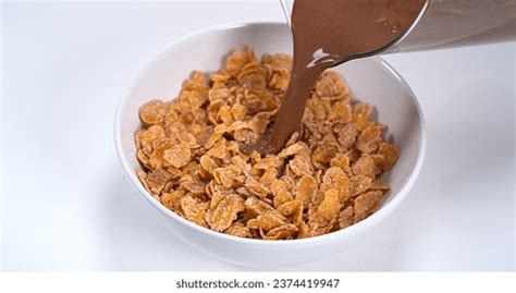 4 Still Life Photo Bowl Milk Cereal Milk Pouring Chocolate Cereals Falling Into Bowl Images ...