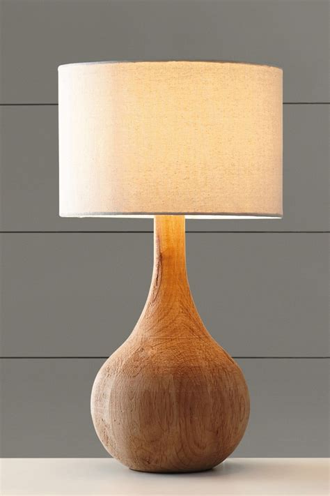 Pin by Alex Phillips on Beach Bar and Lounge | Wooden table lamps, Table lamp wood, Wood lamps