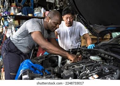 Asian Man Fixing Car: Over 5,422 Royalty-Free Licensable Stock Photos | Shutterstock