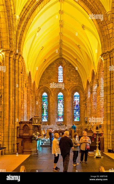 DORNOCH SUTHERLAND SCOTLAND DORNOCH CATHEDRAL INTERIOR WITH TOURISTS ...