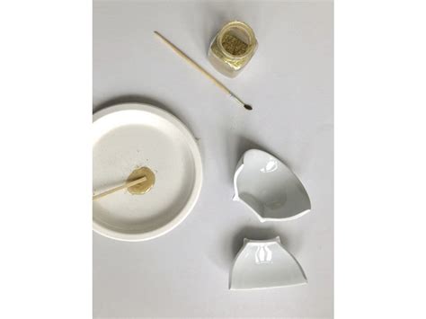 Kintsugi is an old Japanese art of fixing broken pottery with gold. New kintsugi is a new way of ...