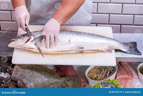 Man filleting a salmon stock image. Image of fish, slicing - 87525779