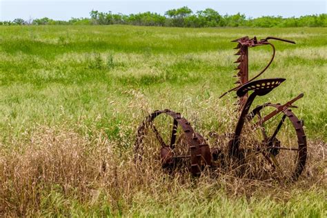 Rusty Old Texas Metal Farm Equipment in Field Stock Photo - Image of early, tires: 64010554