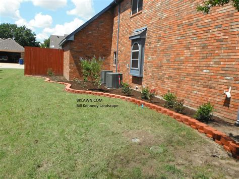 paver stone edging, landscape and mulch will keep these beds looking pretty. | Stone edging ...