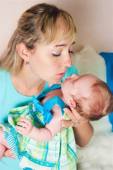 Mother Kissing Daughter Lips Stock Photos - Free & Royalty-Free Stock Photos from Dreamstime