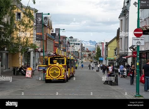 Norway, Tromso, Downtown Tromso. The Arctic Train, a sightseeing tram that takes passengers ...