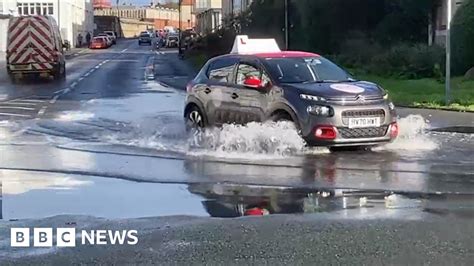 Isle of Wight councillor checks drains ahead of flood warning - BBC News