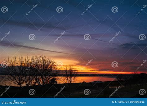 Reflection of a Golden Sunset on the Water of Pegwell Bay, Ramsgate ...