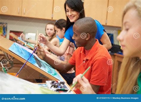 Male Pupil in High School Art Class with Teacher Stock Image - Image of happy, background: 41532115