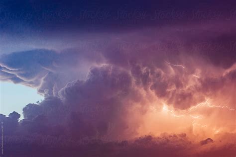 "Storm Sunset" by Stocksy Contributor "Javier Pardina" - Stocksy