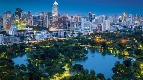Lumpini Park and the skyline of Bangkok, Thailand 🇹🇭 This 142 acre park is located in Bangkok ...