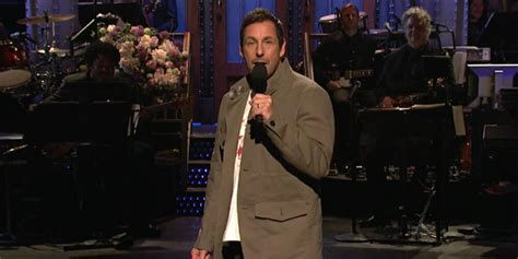 Adam Sandler Returns to 'SNL,' Sings About Getting Fired From The Show