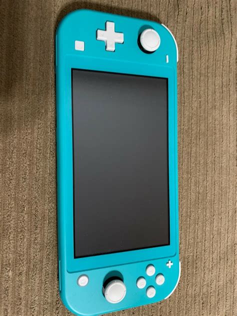 Nintendo Switch Lite - Turquoise EXCELLENT CONDITION - iCommerce on Web