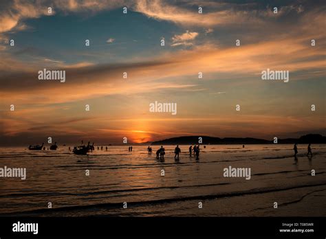 Sunset on Ao Nang beach Stock Photo - Alamy