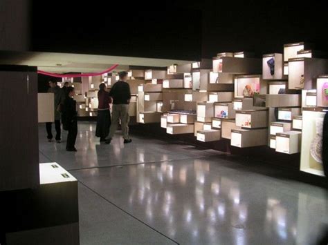 Museum exhibition: multilevel lighted cubes | Museum exhibition design ...