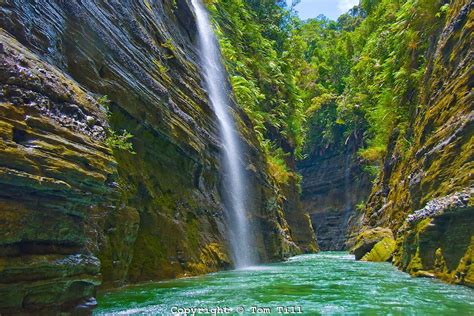 fiji waterfalls Falls on Upper Navua River, River Canyon with waterfalls and rainforest, Viti ...