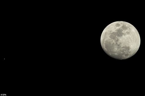 Fish 'n pics: Huge 'sturgeon moon' is captured by photographers as it beams down on a watching ...