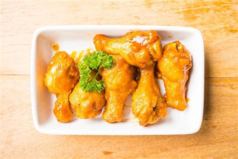 Grilled buffalo wings in white plate 2164039 Stock Photo at Vecteezy