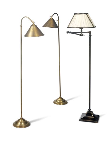 A PAIR OF BRASS ADJUSTABLE FLOOR-STANDING READING-LAMPS , MODERN ...