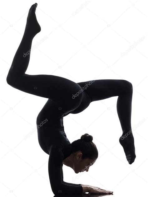 Woman contortionist exercising gymnastic yoga silhouette Stock Photo by ©STYLEPICS 31093039