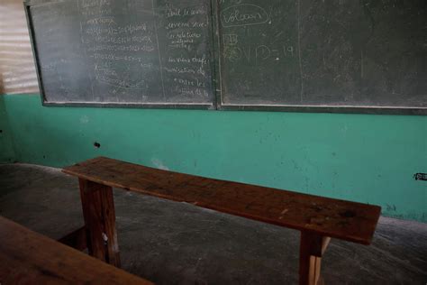 A Desk is Seen in an Empty Classroom Photograph by Andres Martinez ...