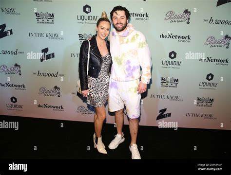 NFL player Baker Mayfield right and wife Emily Mayfield attend the Bootsy On the Water at the ...