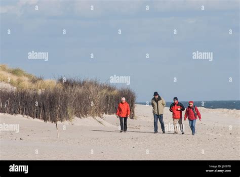 People walking on a beach in Helgoland Stock Photo - Alamy