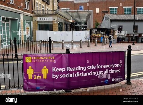 Reading Council advisory banner in front of entrance to The Oracle shopping centre, screened off ...