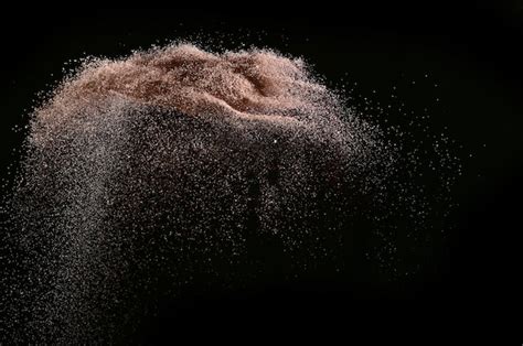 Premium Photo | Abstract brown powder explosion