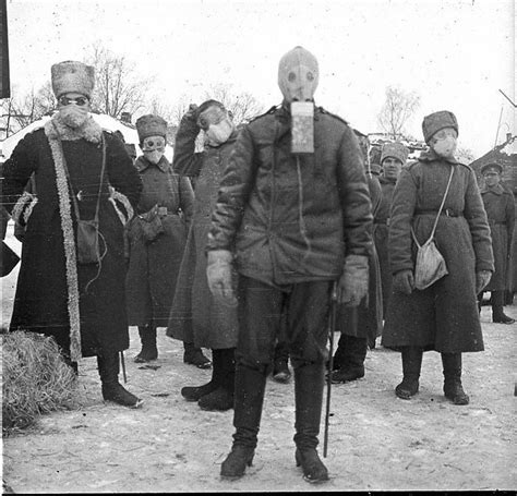 Russian soldiers on field trials of gas masks Zelinsky-Kummantova 1916. [700x672] | Gas mask ...