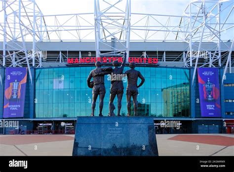 Trinity Statue of George Best, Bobby Charlton, and Denis Law outside of ...