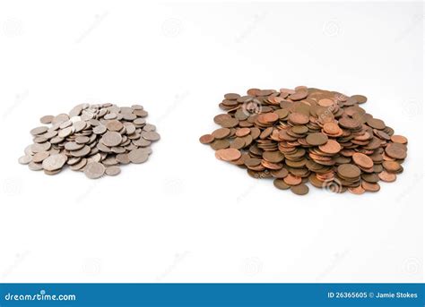 Big Pile Of Pennies- Little Pile Of Silver Coins Royalty Free Stock Photo - Image: 26365605