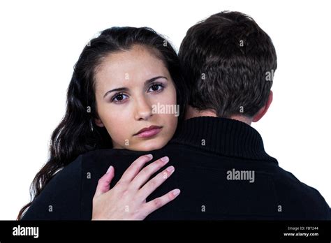 Couple hugging sad hi-res stock photography and images - Alamy