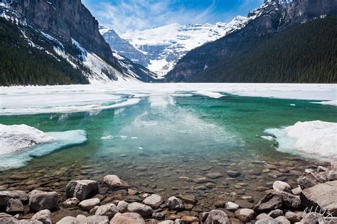 Lake Louise Red Canoe - Banff National Park Poster - Landscape ...