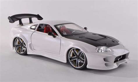 Toyota Supra white/carbon Jada Toys diecast model car 1/18 - Buy/Sell ...