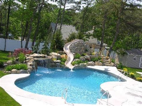 Swimming pool designs with slides | Hawk Haven