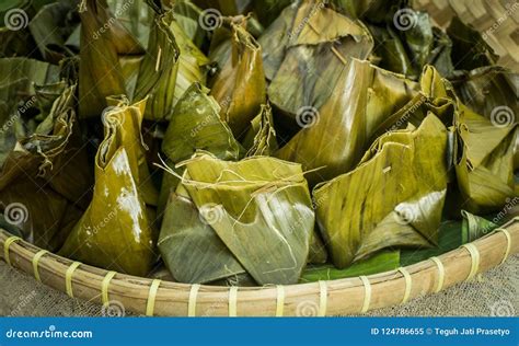 Nagasari, Traditional Steamed Cake Made from Rice FlourFilled with Sliced of Banana. Wrapped in ...