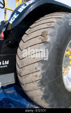 tractor puller pulling tires tyres wheels large big cut rubber grip shallow tread Stock Photo ...