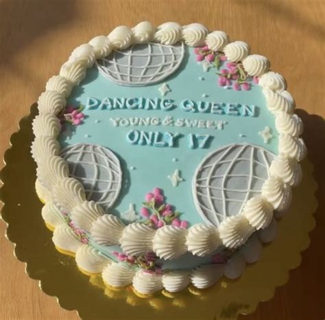 a cake that is sitting on top of a table with the words dancing queen ...