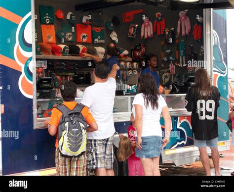 miami dolphins fans at a merchandise store trailer at sun life stadium ...