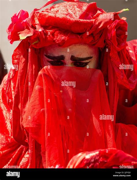 The Red Brigade at the Extinction Rebellion demonstration, at Oxford Circus, London, in protest ...