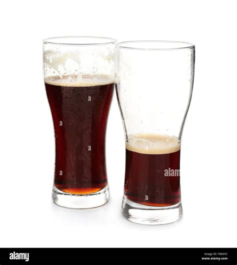 Glasses of cold beer on white background Stock Photo - Alamy