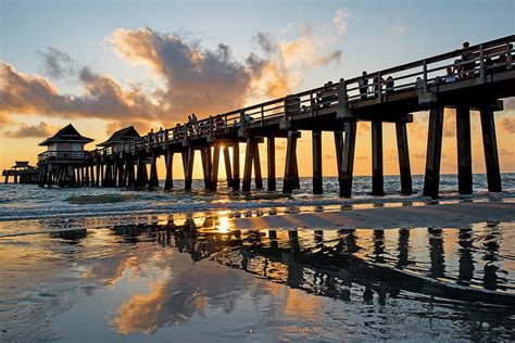 Naples pier at sunset Naples Florida Ripples Photograph by Toby McGuire - Pixels